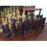 A resin moulded chess set with mediaeval characters. (32)