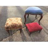 A square Victorian upholstered stool on turned legs; a rectangular footstool with reeded rails on