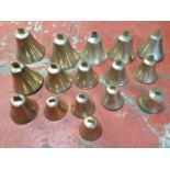 A collection of sixteen Victorian servants bells, each numbered and ringing different tones, with