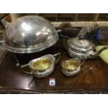 A Victorian silver plated breakfast egg shaped serving dish with foliate engraved decoration, the