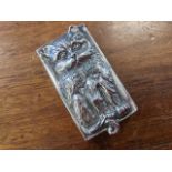 A silver plated vesta embossed with cats to rectangular panels set with marcasites, with sprung