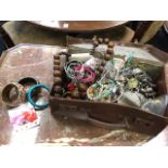 A suitcase-full of jewellery - bangles, necklaces, rings, pendants, brooches, bracelets, earrings,