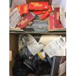 Two boxes of Hornby Tri-ang gear - track, boxed pieces, level crossing, power unit, fencing, etc. (A