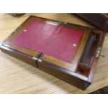 A Victorian locking mahogany writing box inlaid with brass shield escutcheons, the interior with