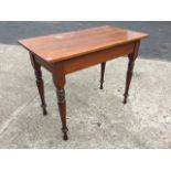 A Victorian pitch pine side table, with rectangular top on turned tapering legs. (37in x 19in x 28.