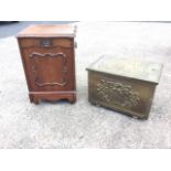 A scalloped and moulded topped walnut coal box, having drop-down front scroll panelled