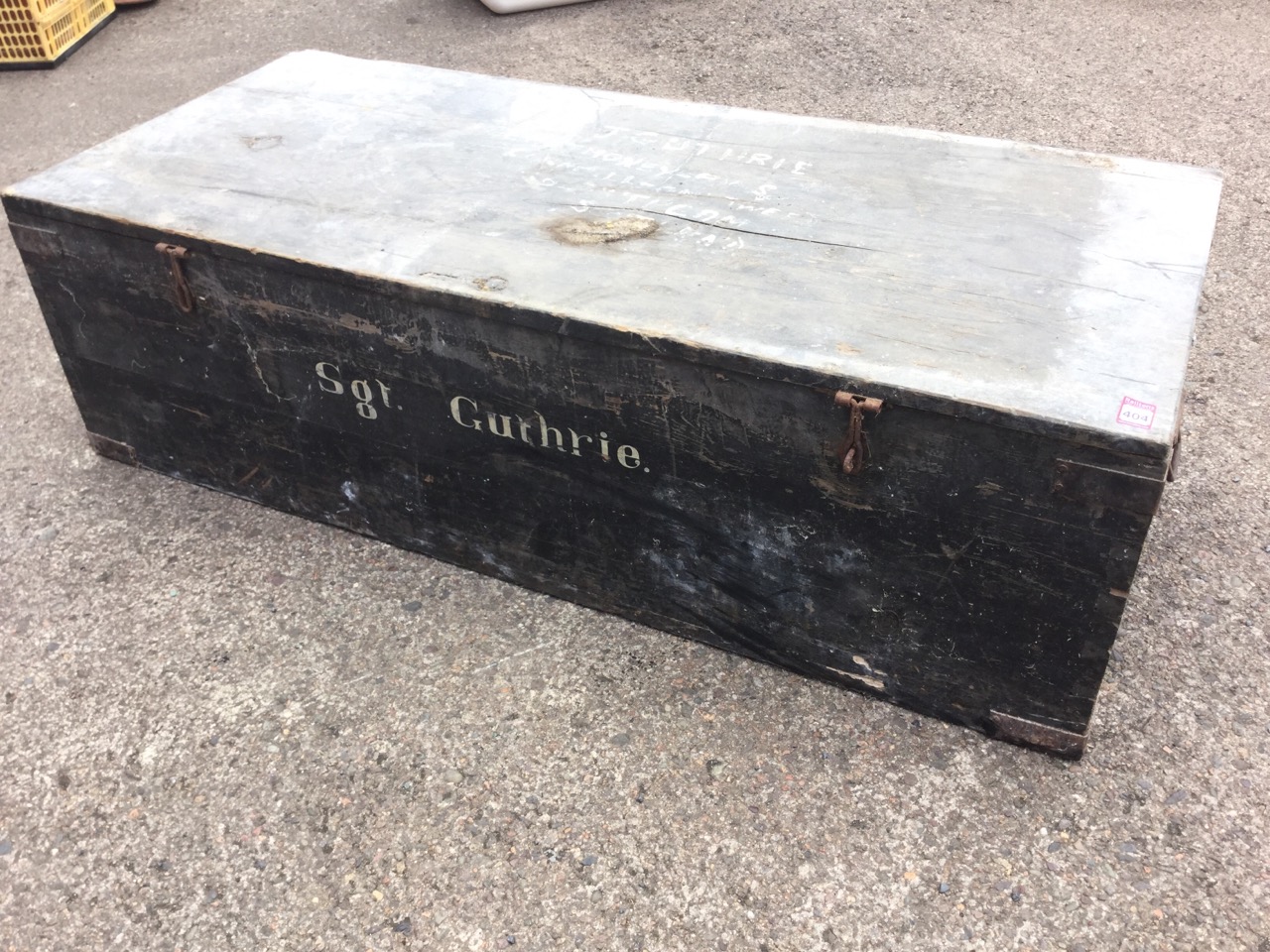 A rectangular pine army trunk, the dovetailed box with iron mounts and carriage handles, ex Sgt J