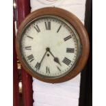 A Victorian oak cased wallclock, the enamelled dial with roman chapters under glass, the movement