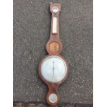 A nineteenth century mahogany barometer by B Porry of Skipton, the case framed by boxwood & ebony