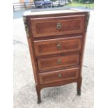 A C20th French walnut cabinet of four drawers, with canted corners and brass mounts, the drawers