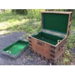 An Edwardian oak silver box having interior with baize lining and tray, having metal mounts and iron