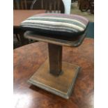 An unusual late Victorian rise-and-fall stool or stand, the rectangular rounded top with later