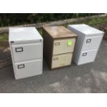 Three two-drawer metal filing cabinets, the drawers with label holders, one with key. (18.5in x 24.