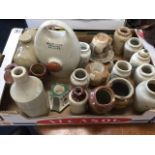 A collection of stoneware jars and bottles - breweries, cream pots, pub match strikers, hot water