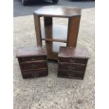 A 50s octagonal oak coffee table with two undershelves; and a pair of small three-drawer cabinets