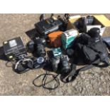 A quantity of cameras & photographic gear - Fujifilm, Nikon, some cased, lenses, a Kodak instant,