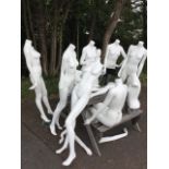 A quantity of lady mannequins, four complete with stands, busts, limb parts, etc. (A lot)