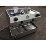 A Fracino Italian coffee machine, with tray top above a dashboard with knobs & dial, having grill