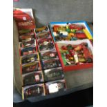 Two boxes of ‘played with’ Corgi, Matchbox, Dinky cars, lorries, tractors, etc; and a set of sixteen