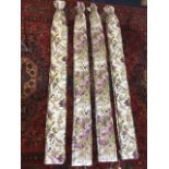 Two pairs of lined & interlined linen curtains, the fabric printed with purple flowers and scrolling