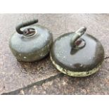 Two Victorian polished granite curling stones with brass & wood handles. (10in) (2)