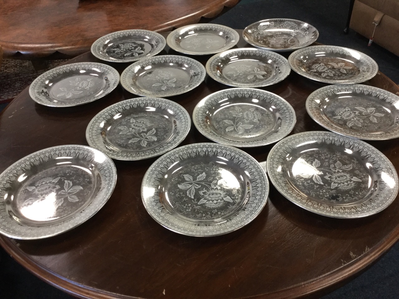 A Wedgwood Etruria silver glazed dessert set with 12 plates & serving bowl, all with prunus