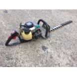 A Makita EH561 petrol hedgecutter. (41in)