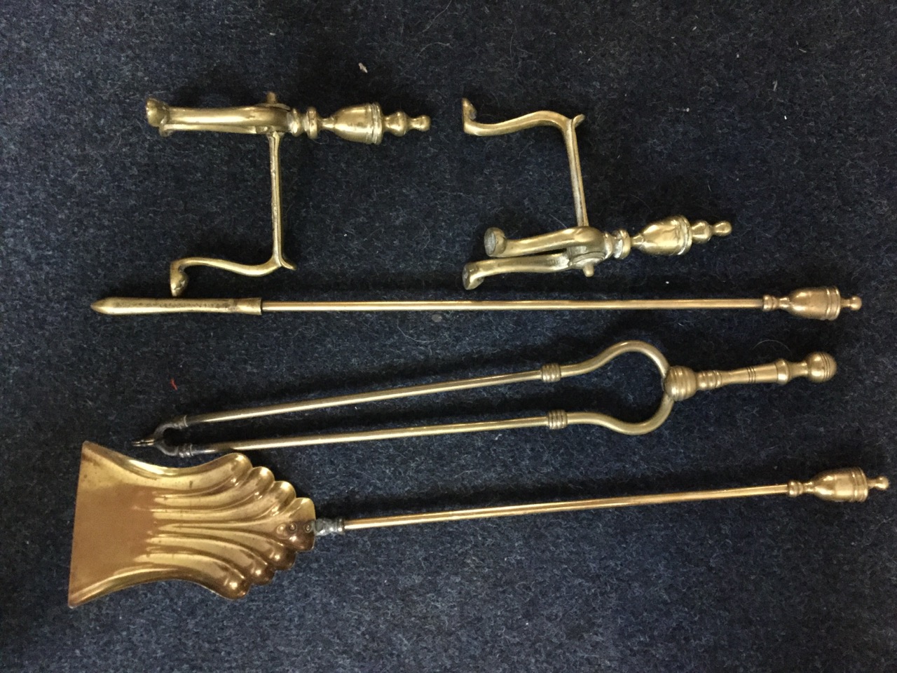 Three brass fire irons - tongs, poker & shovel, together with an associated pair of firedogs with