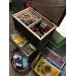 A sewing box stool with internal tray containing a large quantity of sewing materials, scissors,