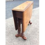 A Victorian mahogany sutherland table, the moulded top with two long drop-leaves raised on twin