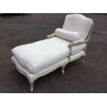 A painted Louis quaize style daybed, with double caned scalloped back and scrolled arms above a