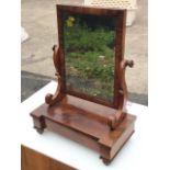 A Victorian mahogany dressing table mirror, the rectangular plate in cushion moulded frame on