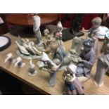 A collection of Lladro figurines, ducks, children, oriental, Don Quixote - one Nao. etc. (13)