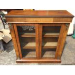 A Victorian walnut cabinet, the rectangular moulded top above a frieze inlaid with floral