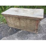 A nineteenth century carved hardwood blanket box of dovetailed construction having interior