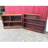 A stained open bookcase with three shelves on rectangular plinth - 38in; and a set of pitch pine