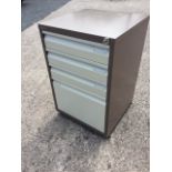 A modern Bisley four drawer metal cabinet. (18.5in x 18.5in x 28.5in)