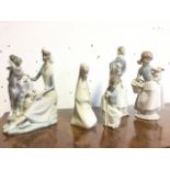 Five Lladro young girl & boy figurines, including lambs & goat. (5)