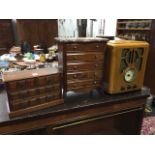 A vintage style oak cased CD player; a musical jewellery cabinet modelled as a miniature mahogany