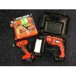 A cased Black & Decker drill, complete with instruction booklet; and another boxed smaller drill