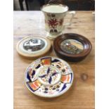 A nineteenth century Staffordshire gaudy welsh style tankard with copper lustre rim; two framed