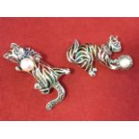 A 925 silver cat brooch set with rubies to collar and eyes, playing with seed pearl mounted ball,