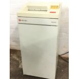 A Rexel 1500 automatic industrial paper shredder. (17in x 17in x 34.5in)