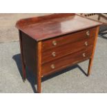 An Edwardian mahogany chest decorated with chequered boxwood & ebony stringing, having three long