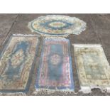 Four Chinese thick-pile pastel woven rugs. (4)