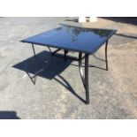 A garden table, with square glass top having central hole for sunshade. (39.5in x 39in x 28in)