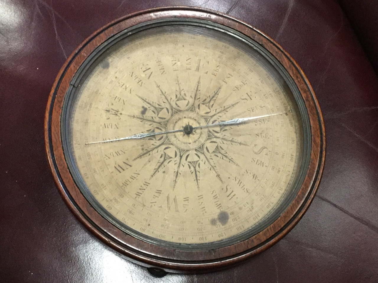 An eighteenth century mariners compass, owned by Lord Nelson and given to his Northumbrian born