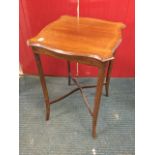 A square Edwardian mahogany occasional table, the scalloped top with canted corners inlaid with