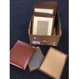 A box of fourteen modern pictures frames - sets, etc; and a faux leather photo album. (15)
