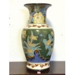 A large Chinese stoneware vase with waisted neck and flared rim, decorated with scrafito bamboo